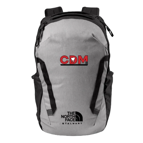 Grey North Face backpack with the CDM logo